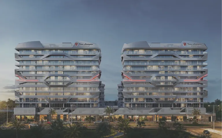 Tonino Lamborghini Residences, twin tower facade at dusk
